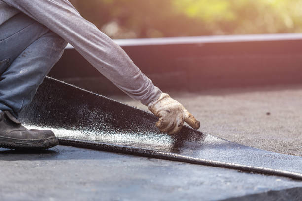 Professional Exterior Waterproofing technician working in Newark, NY